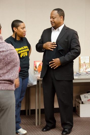 RAGE President, Aysha Butler and Ald. Sawyer of 6th Ward at Real Men Read event